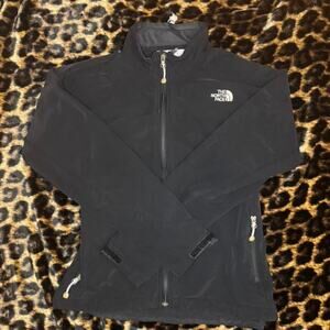 The north face apex black zip u jacket with logo and side pockets